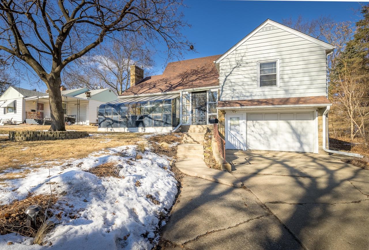 1554 Rural Street Rockford, IL 61107 - Photo 2 of 25 a view of a house with a yard
