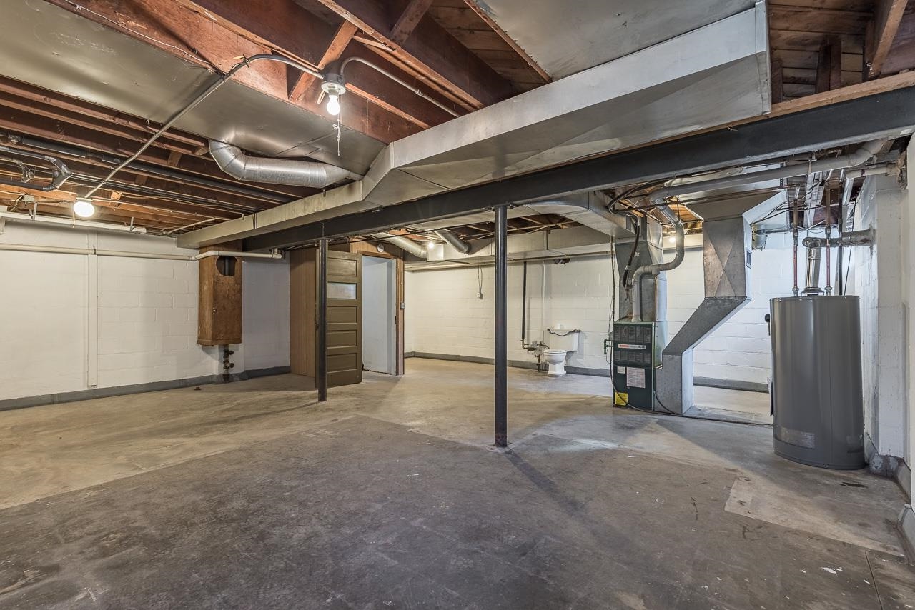 1554 Rural Street Rockford, IL 61107 - Photo 21 of 25 a view of empty room with wooden walls