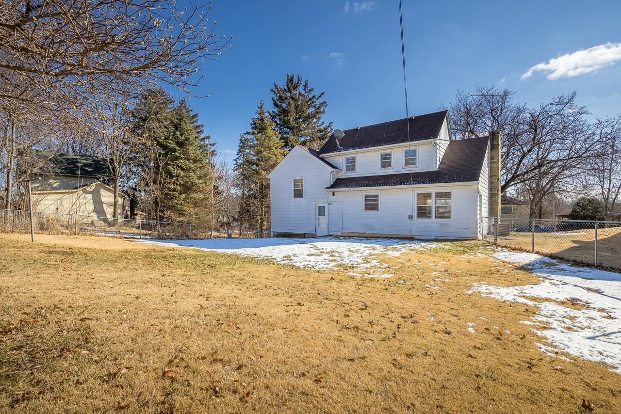 1554 Rural Street Rockford, IL 61107 - Photo 24 of 25 a front view of a house with a yard