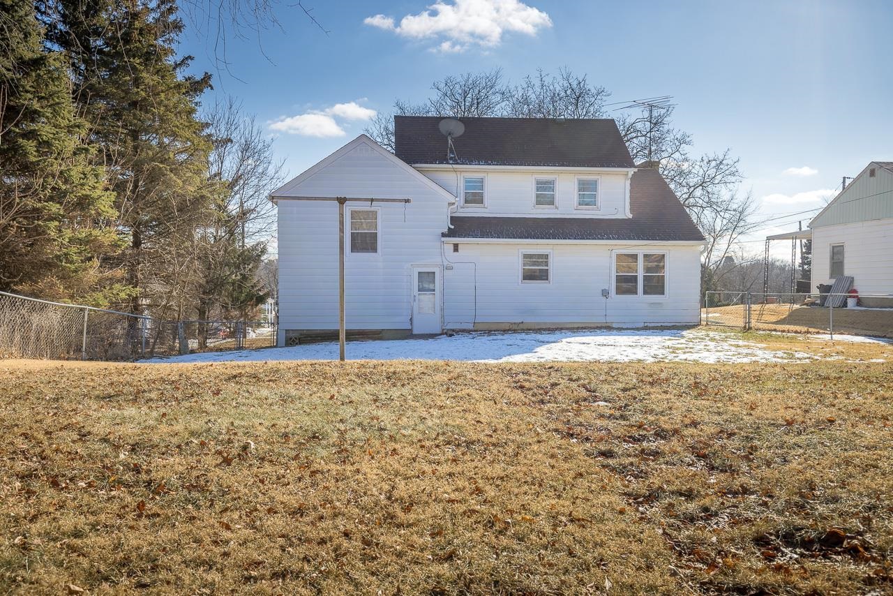 1554 Rural Street Rockford, IL 61107 - Photo 25 of 25 a house that has a tree in front of it