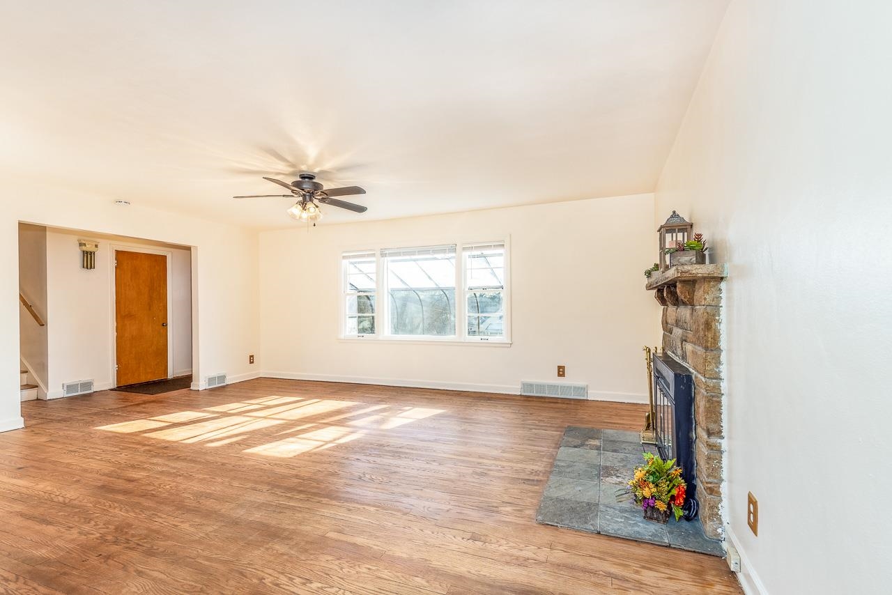 1554 Rural Street Rockford, IL 61107 - Photo 6 of 25 a view of empty room with window and ceiling fan