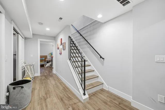 a view of entryway with wooden floor