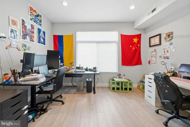 a workspace with furniture and window