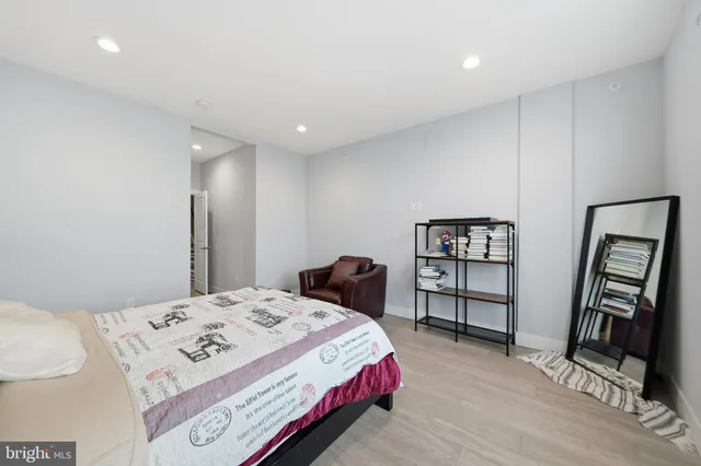 a bedroom with a bed and a closet