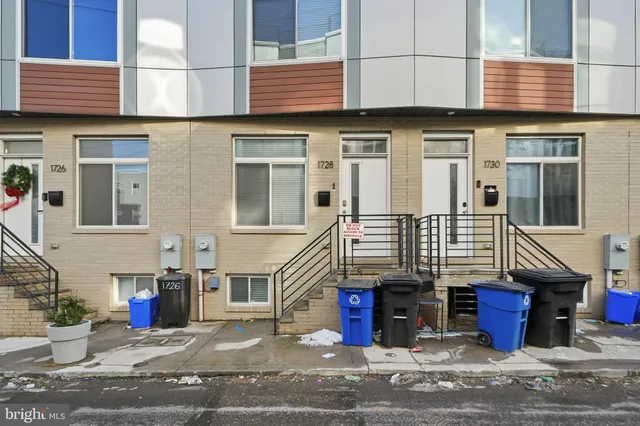 a view of a house with a small garden