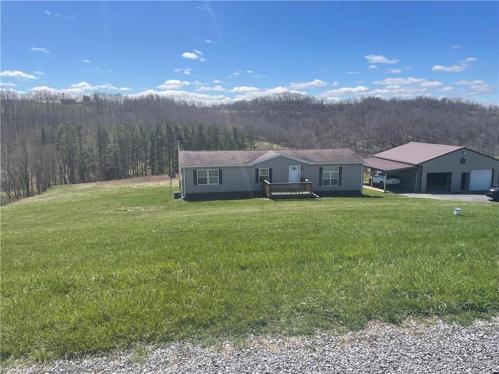 a view of a town with mountains in the background