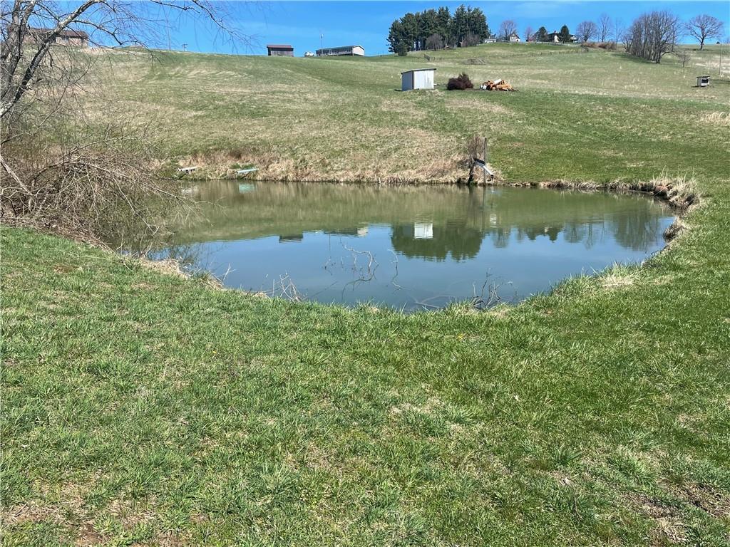 57 Pine Road Claysville, PA 15323 - Photo 12 of 16 a view of a lake with a yard