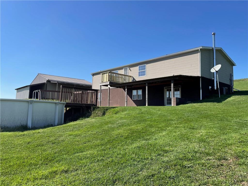57 Pine Road Claysville, PA 15323 - Photo 14 of 16 a view of a house with a yard