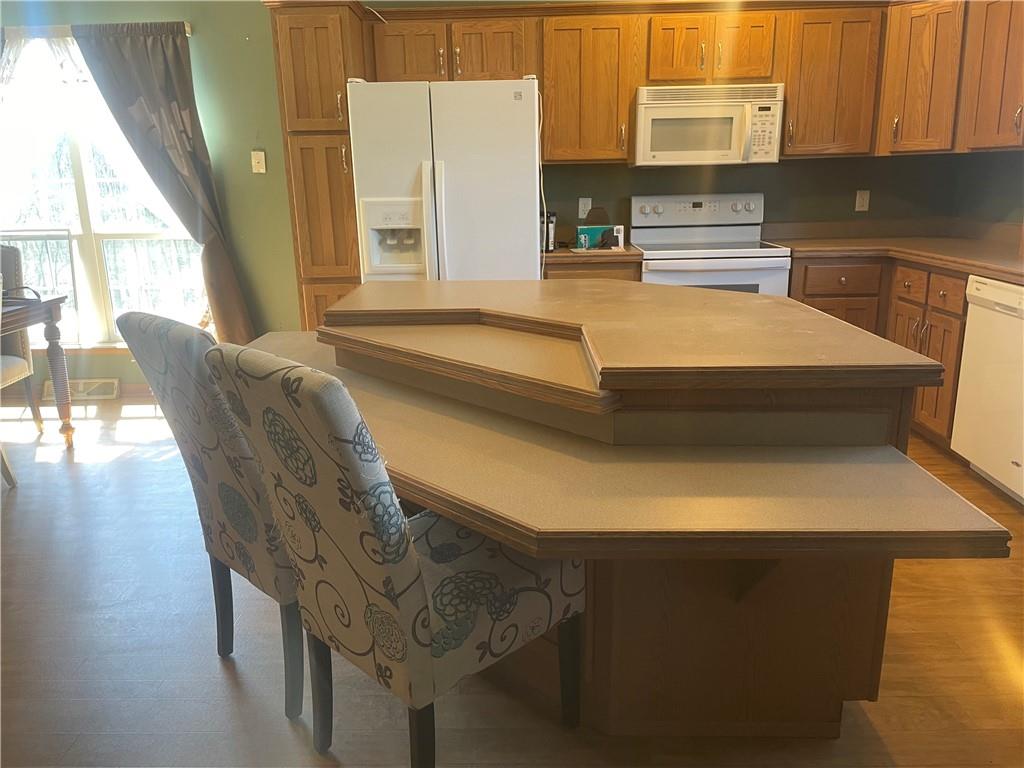 57 Pine Road Claysville, PA 15323 - Photo 4 of 16 a kitchen with stainless steel appliances granite countertop a stove a sink and a microwave