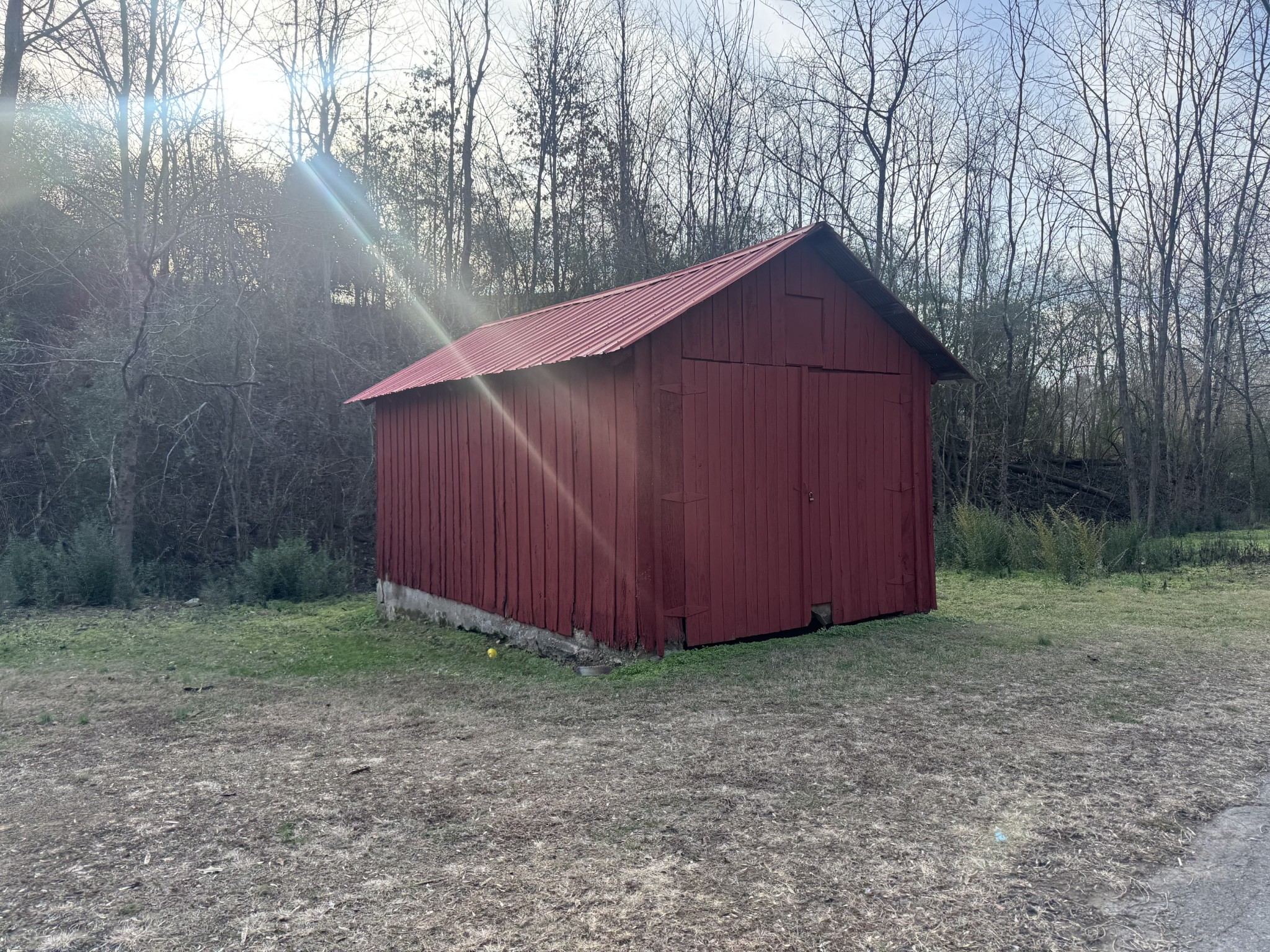 608 Big Rock Road Big Rock, TN 37023 - Photo 15 of 15 a view of backyard with large trees and wooden fence