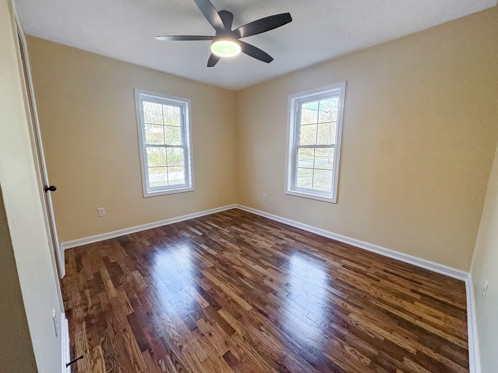 608 Big Rock Road Big Rock, TN 37023 - Photo 8 of 15 a view of an empty room with wooden floor and a window