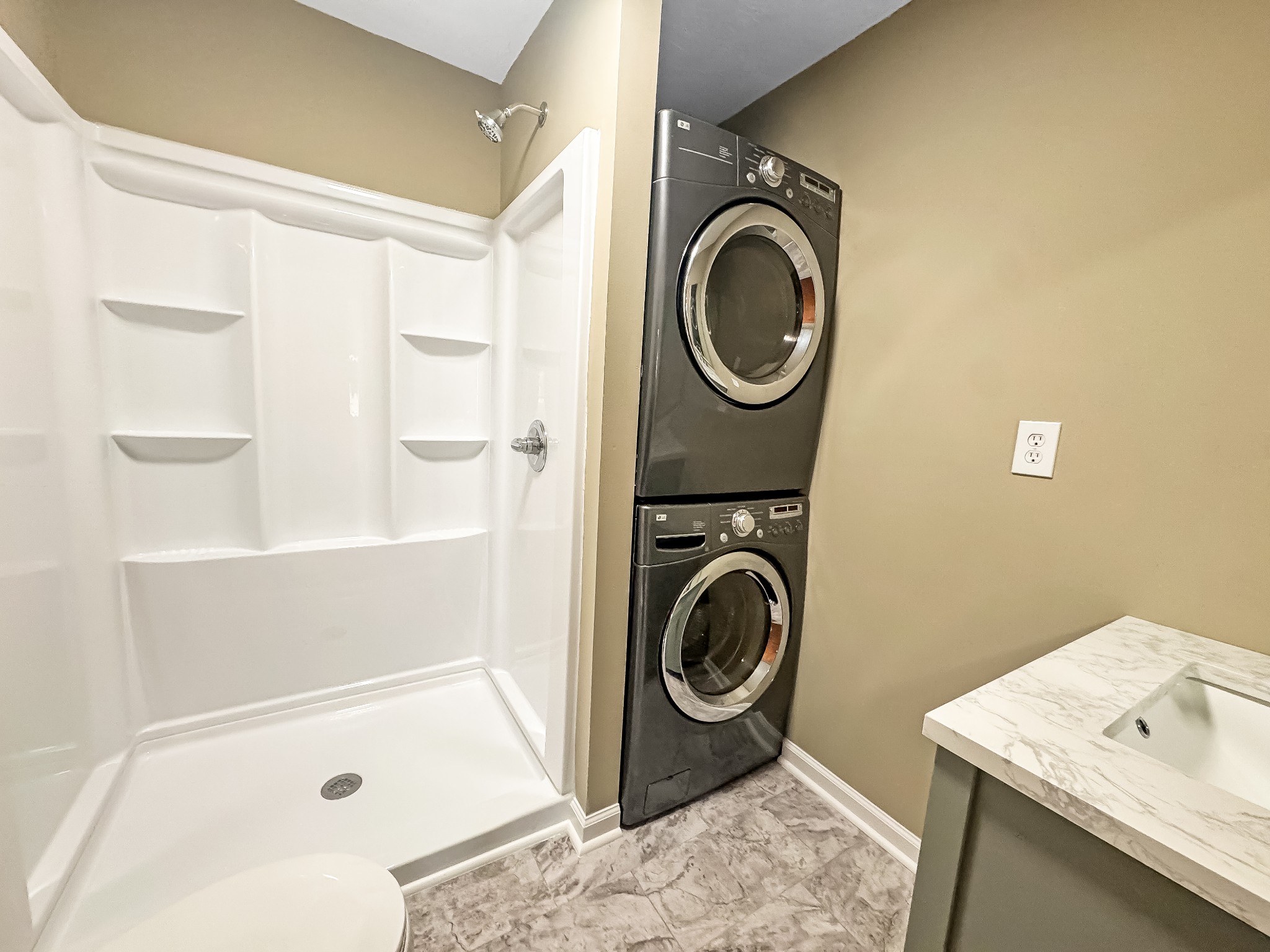 608 Big Rock Road Big Rock, TN 37023 - Photo 9 of 15 a bathroom with a sink a washer and dryer
