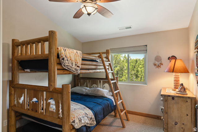 755 South Zion Ridge Drive Orderville, UT 84758 - Photo 63 of 84 Bedroom with baseboards and ceiling fan