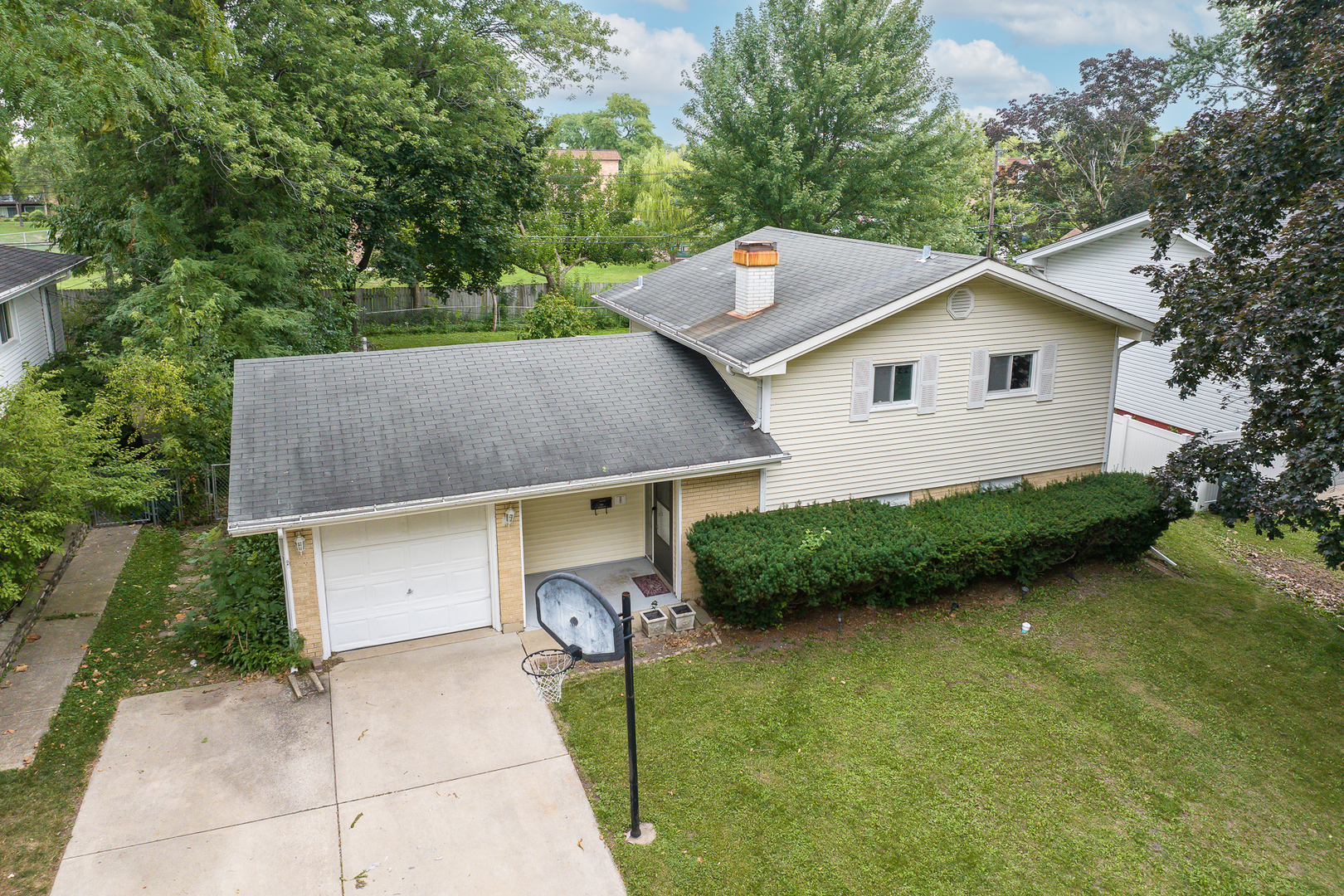 a house view with a garden space