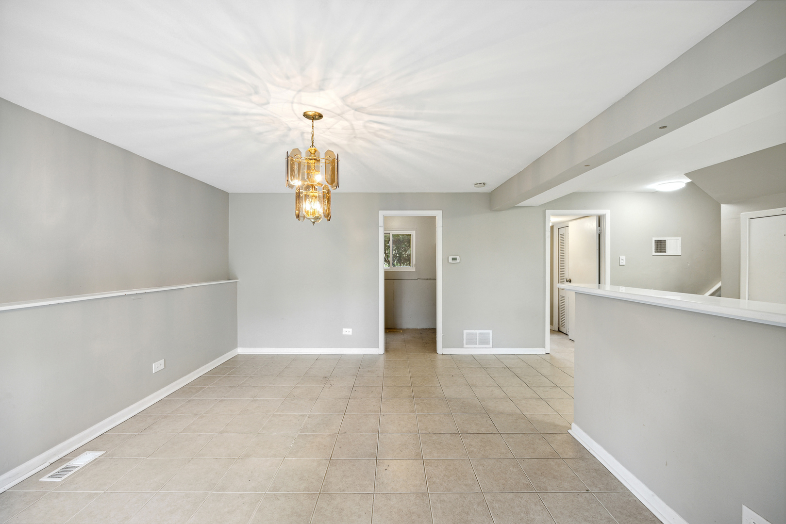 660 Alcoa Lane Hoffman Estates, IL 60169 - Photo 17 of 33 wooden floor in an empty room with a window