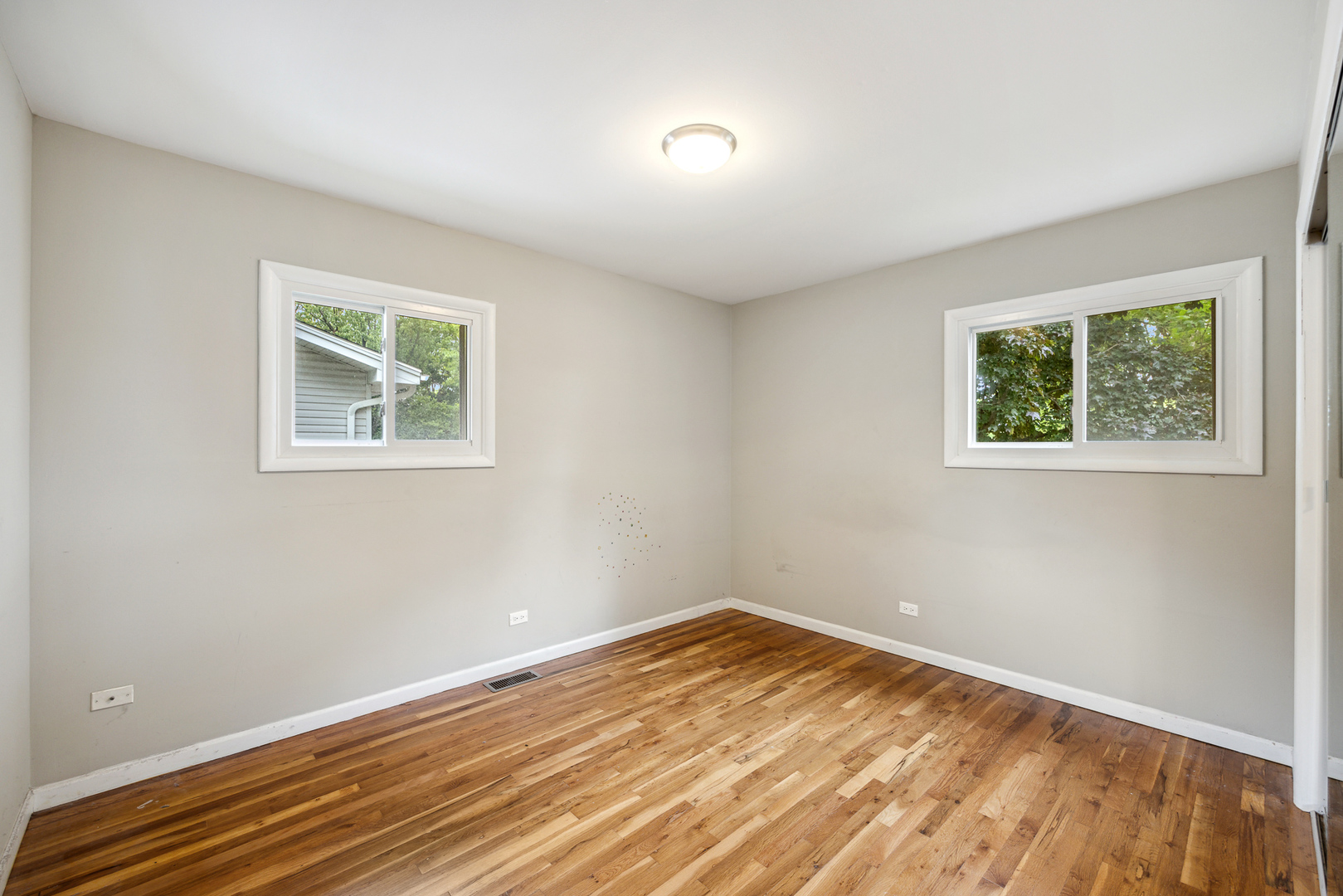 660 Alcoa Lane Hoffman Estates, IL 60169 - Photo 26 of 33 a view of empty room with wooden floor