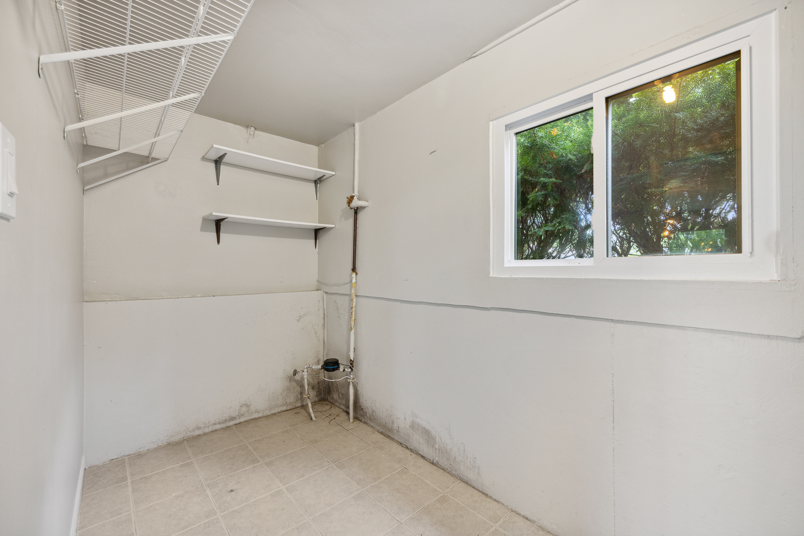 660 Alcoa Lane Hoffman Estates, IL 60169 - Photo 30 of 33 a view of a small space with racks on the wall