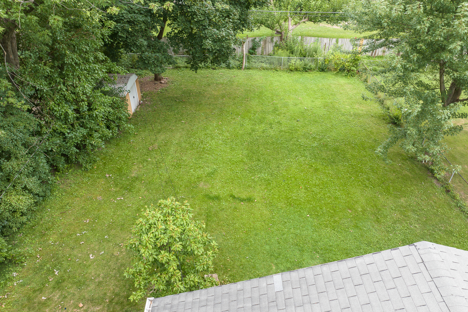 660 Alcoa Lane Hoffman Estates, IL 60169 - Photo 32 of 33 a view of a big yard with large trees