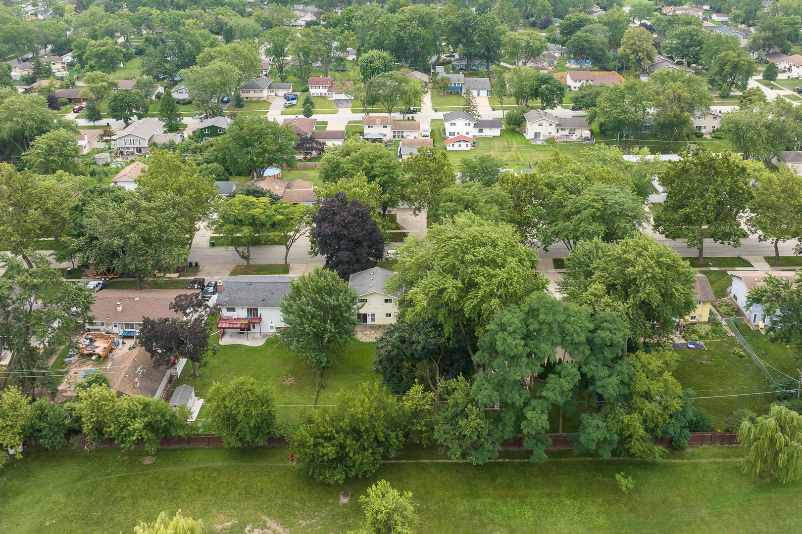 660 Alcoa Lane Hoffman Estates, IL 60169 - Photo 9 of 33 an aerial view of residential houses with outdoor space and trees