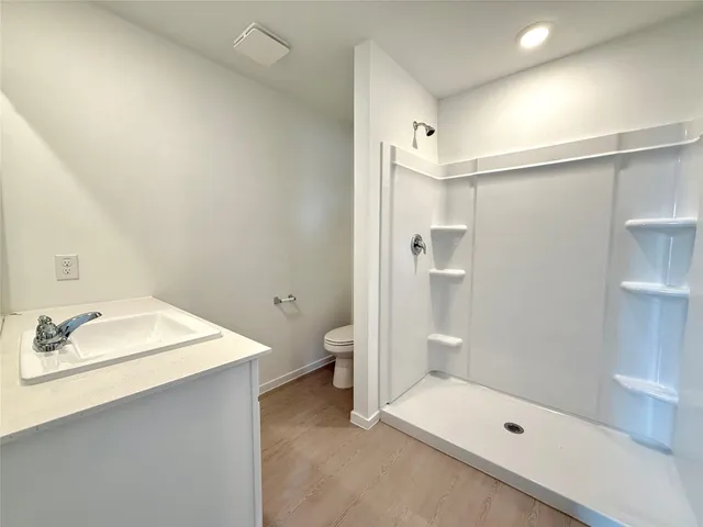 a view of an empty walk in closet