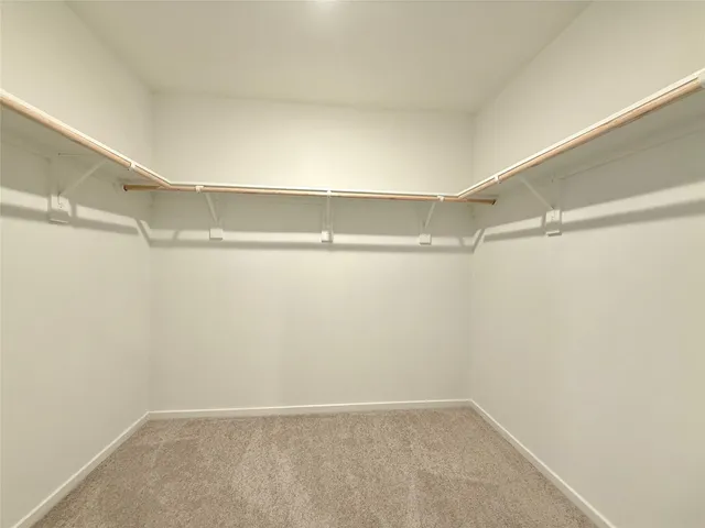 a view of a swimming pool with an outdoor seating