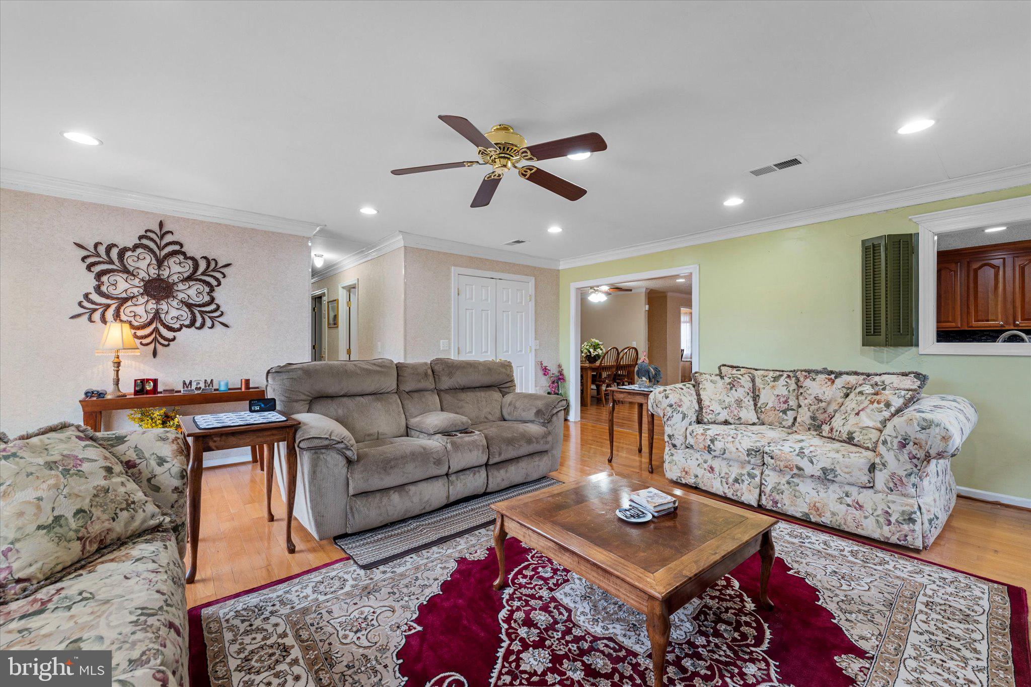 14917 Compton Road Centreville, VA 20121 - Photo 12 of 42 a living room with furniture and a rug