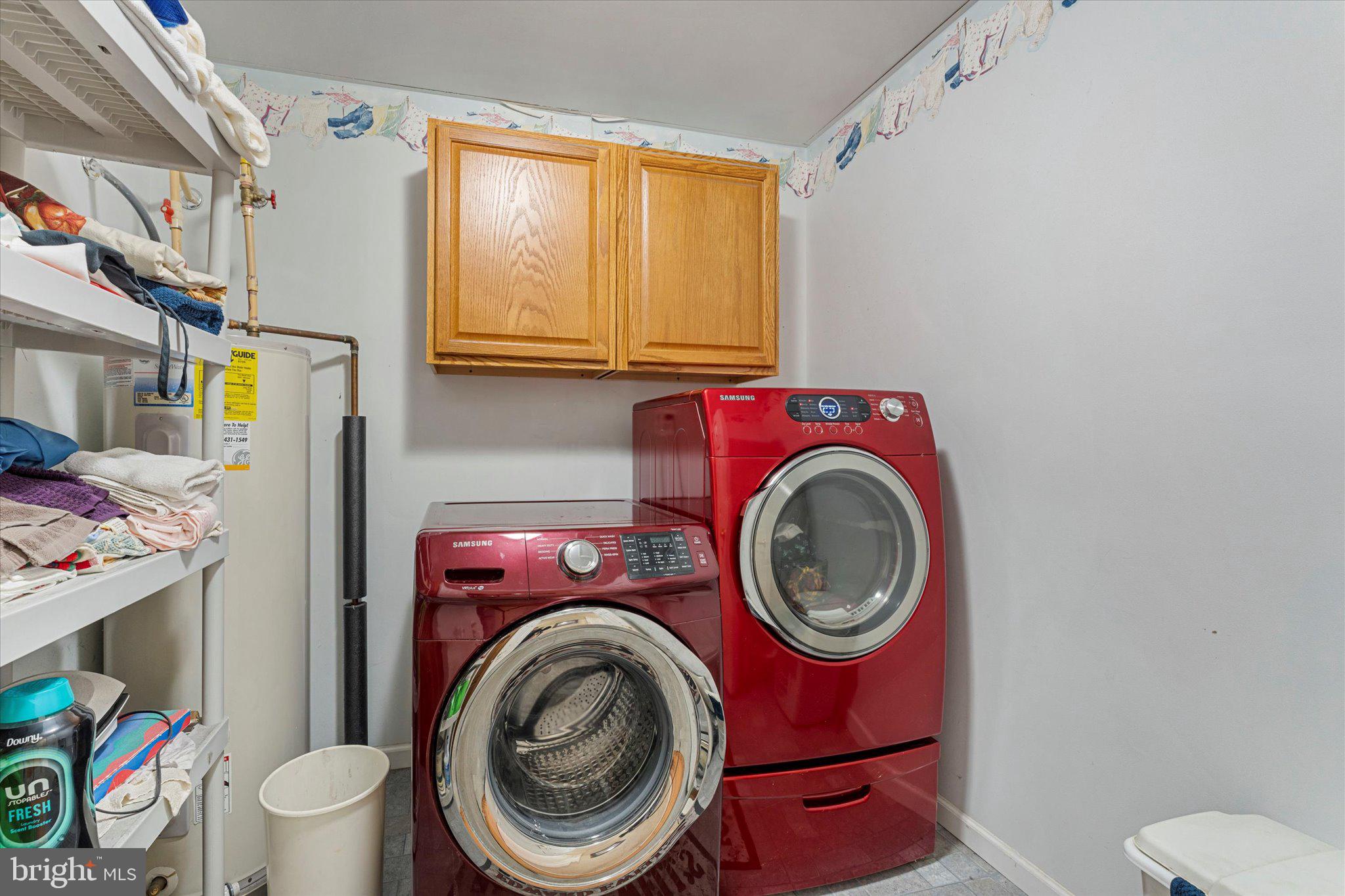 14917 Compton Road Centreville, VA 20121 - Photo 14 of 42 a utility room with a sink a washer and dryer