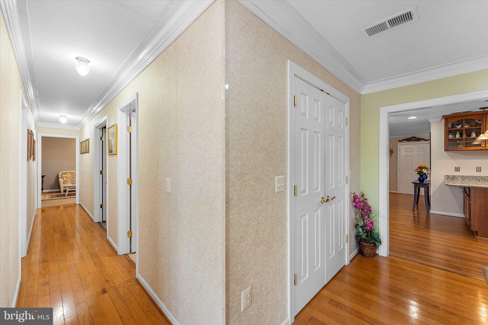 14917 Compton Road Centreville, VA 20121 - Photo 19 of 42 a view of a hallway with wooden floor and closet