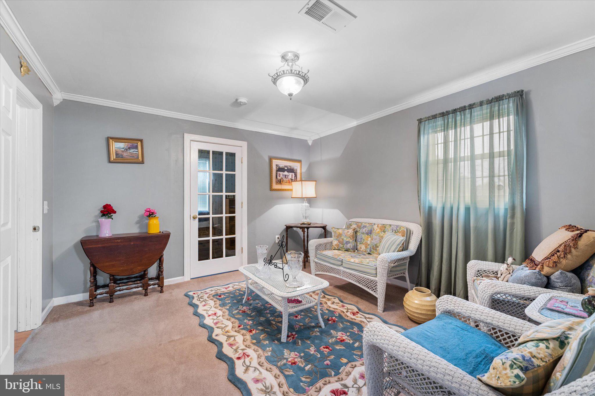 14917 Compton Road Centreville, VA 20121 - Photo 24 of 42 a living room with furniture and a window