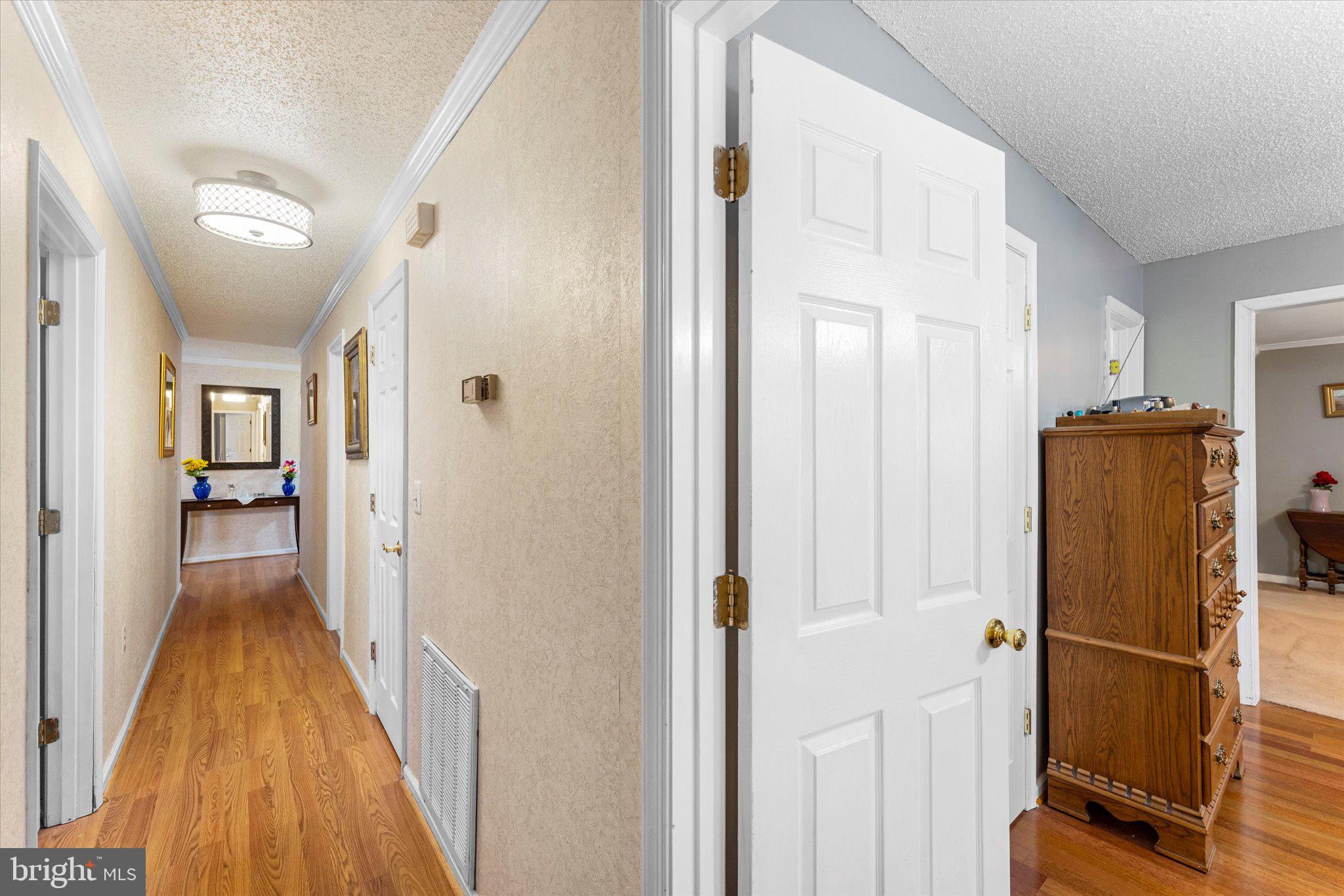 14917 Compton Road Centreville, VA 20121 - Photo 28 of 42 a view of a kitchen from the hallway