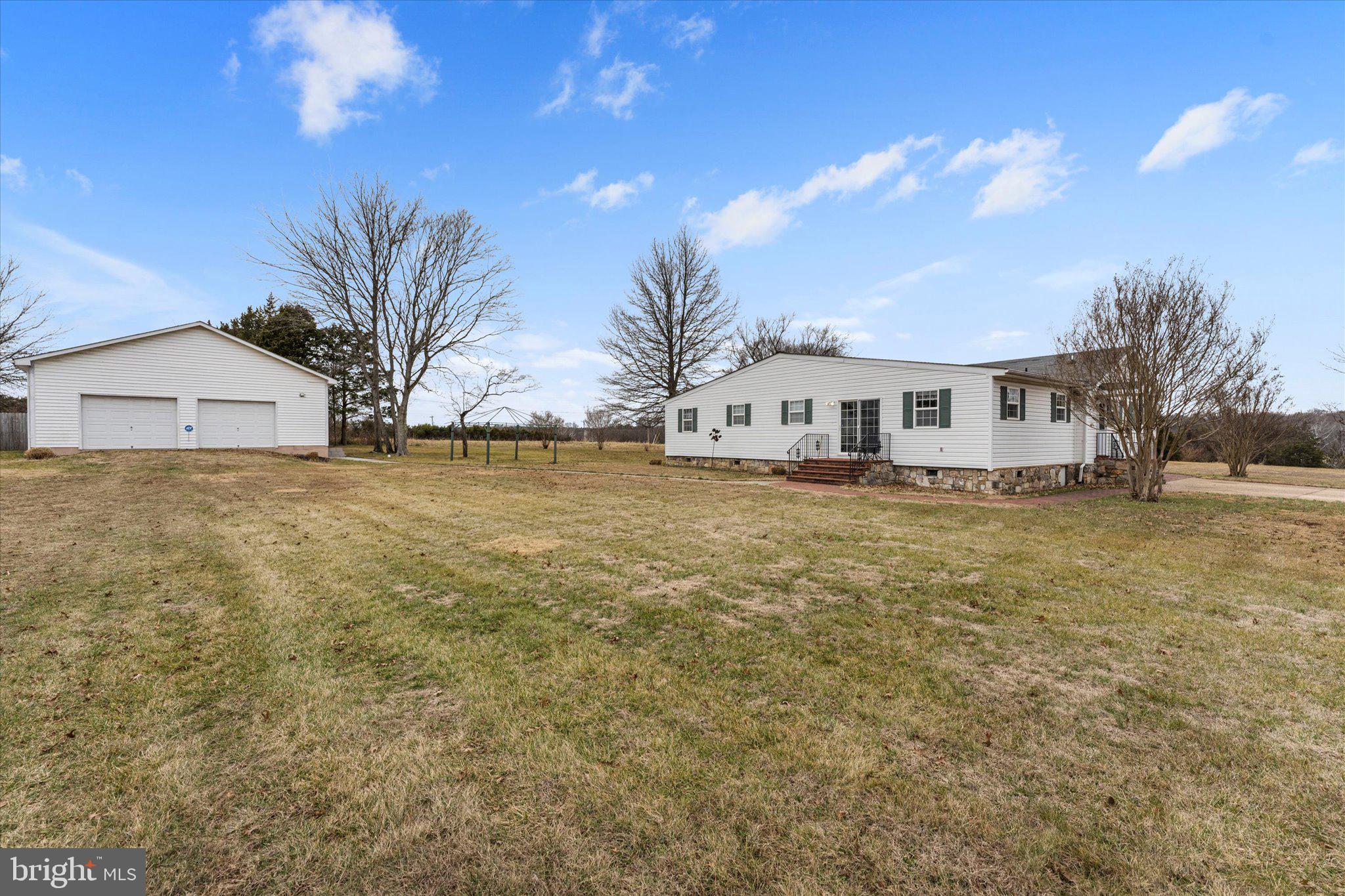 14917 Compton Road Centreville, VA 20121 - Photo 38 of 42 a view of a house with a yard