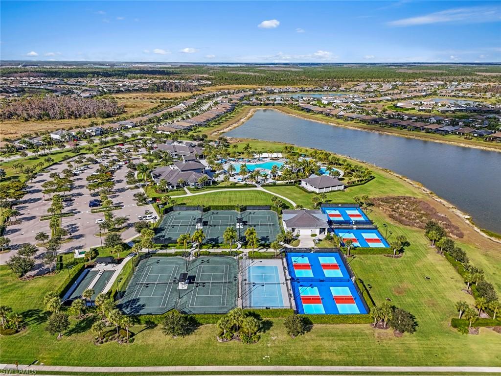 19902 Beverly Park Road Estero, FL 33928 - Photo 34 of 47 Aerial view of residential area with a nearby body of water