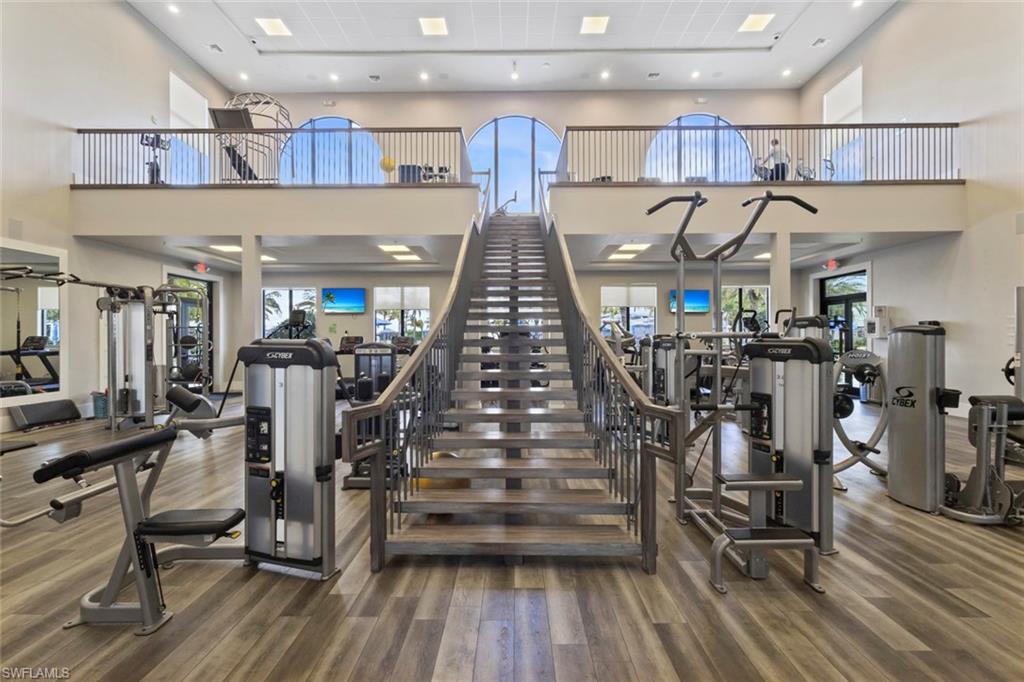 19902 Beverly Park Road Estero, FL 33928 - Photo 40 of 47 Workout area featuring a towering ceiling
