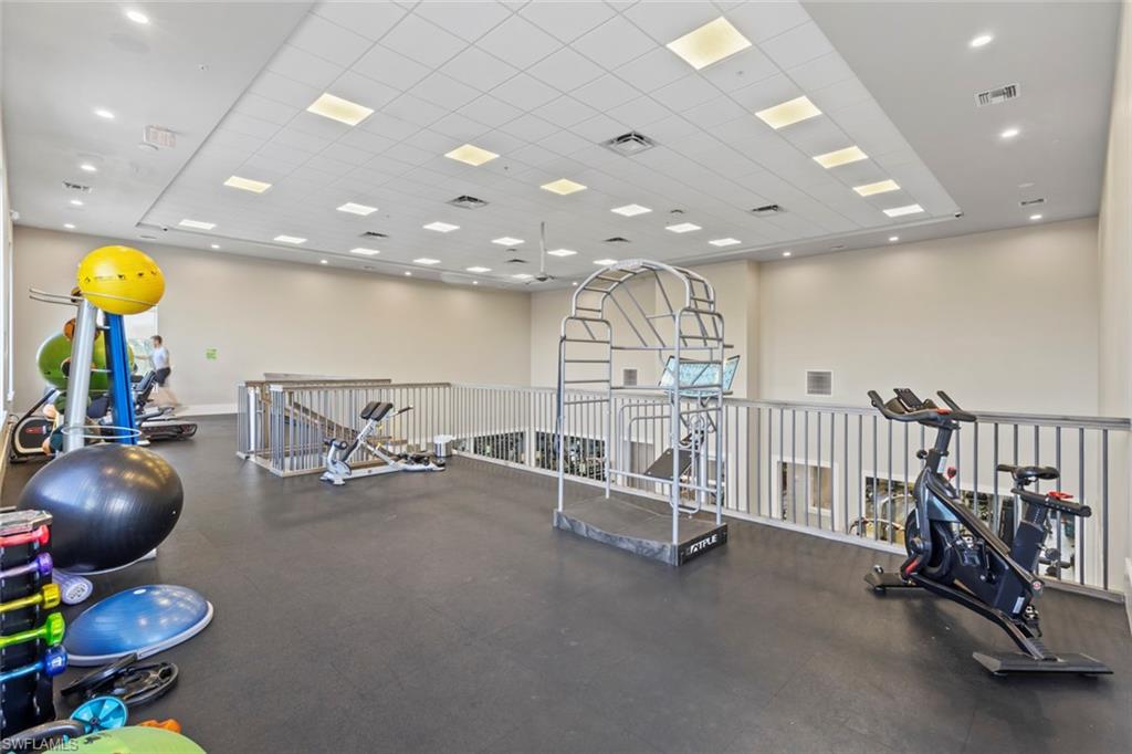 19902 Beverly Park Road Estero, FL 33928 - Photo 42 of 47 Workout area with a paneled ceiling and recessed lighting
