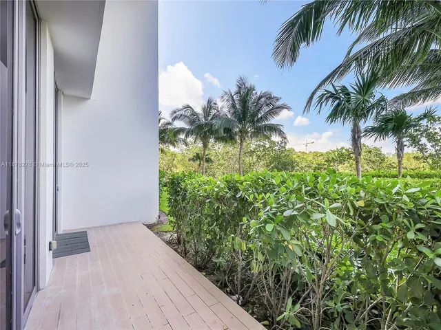 a view of a backyard of a house