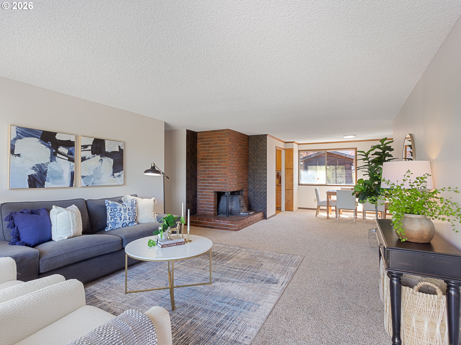 5535 Southwest 142nd Avenue Beaverton, OR 97005 - Photo 12 of 45 a living room with furniture and a large window