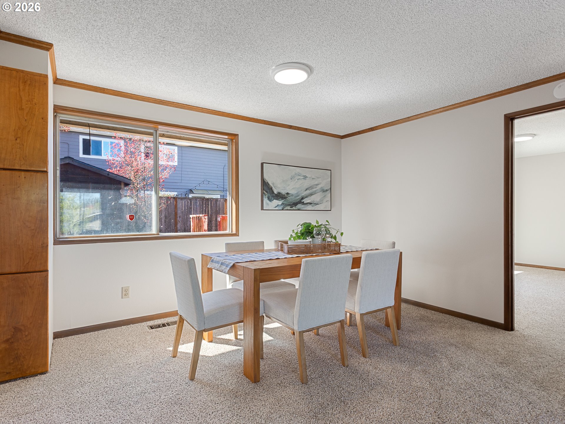 5535 Southwest 142nd Avenue Beaverton, OR 97005 - Photo 18 of 45 a dining room with furniture and window