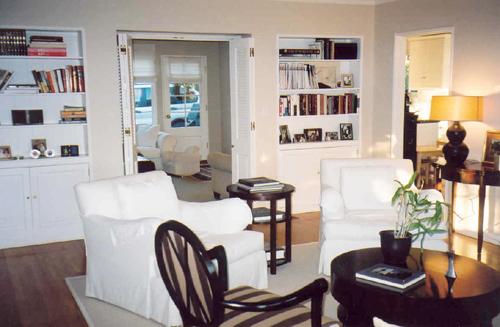 2324 State Street Santa Barbara, CA 93105 - Photo 3 of 9 a living room with furniture and a book shelf