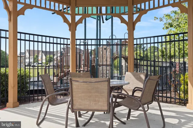 a view of house with outdoor space and lake view