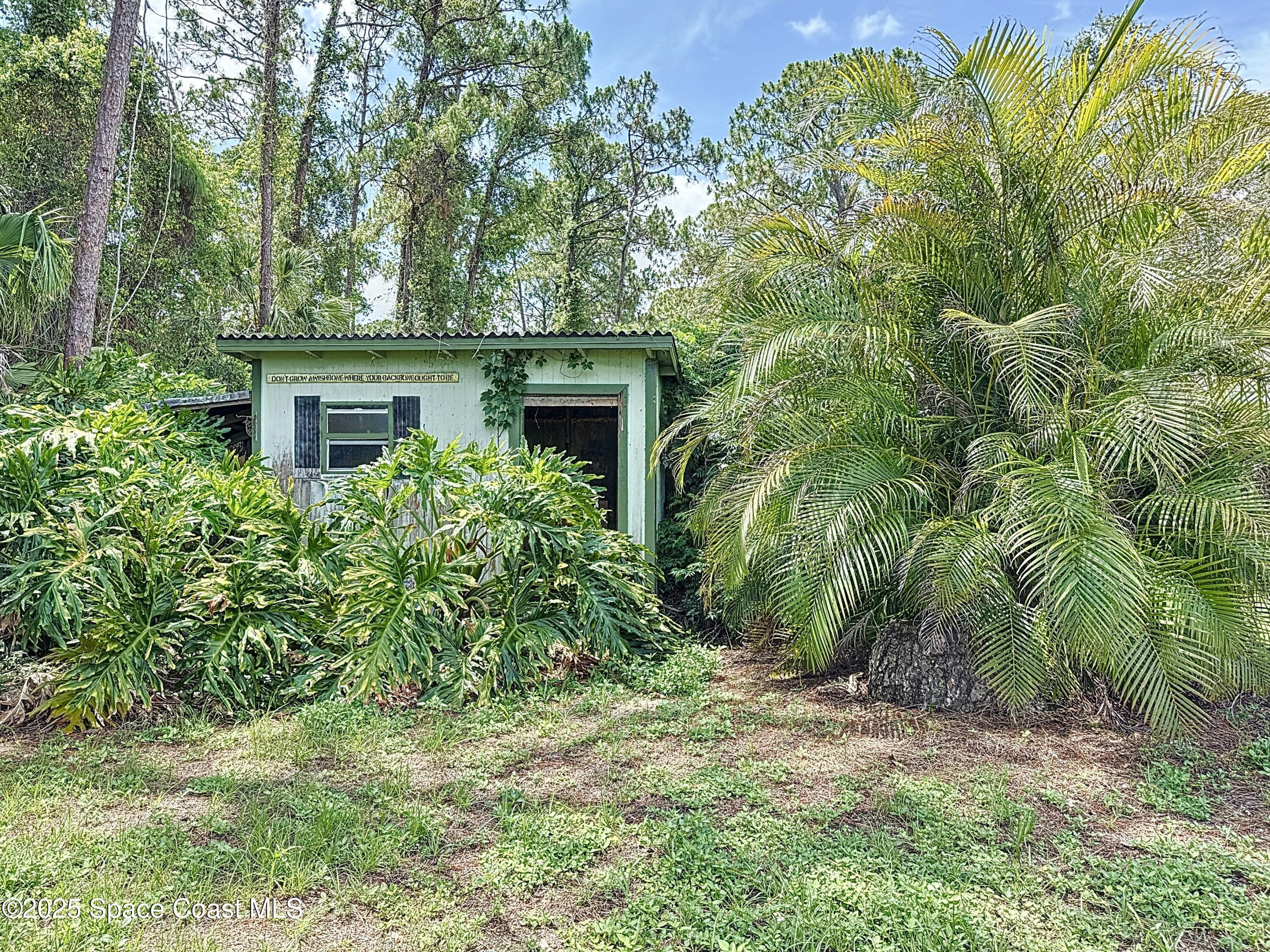 4865 Bridge Road Cocoa, FL 32927 - Photo 30 of 34 Back Yard Shed