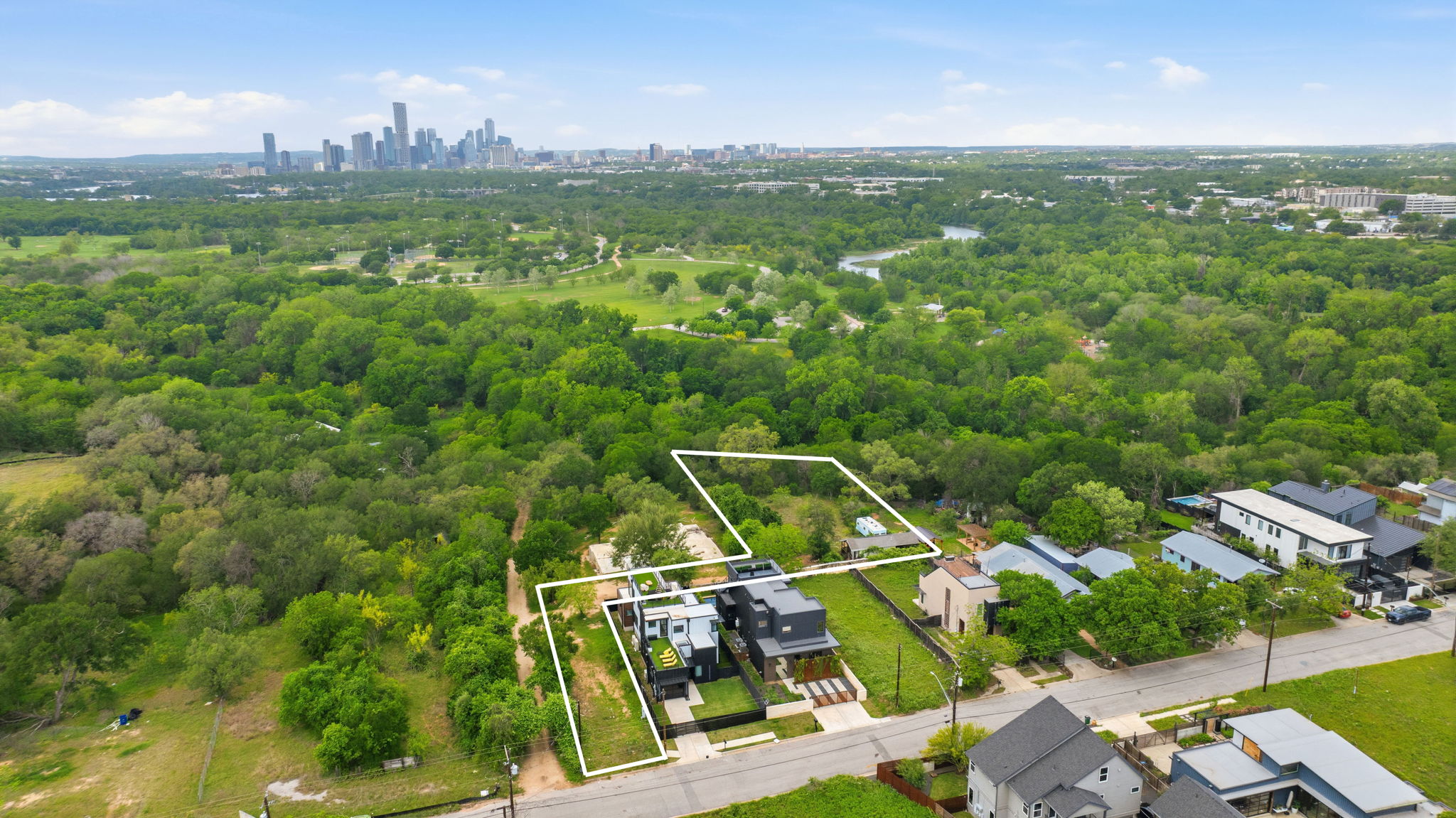 416 Kemp Street Austin, TX 78741 - Photo 4 of 14 Aerial perspective showcasing property within a vibrant urban landscape