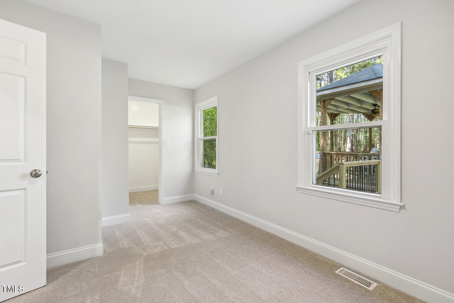 8008 Hollander Place Raleigh, NC 27606 - Photo 18 of 42 Main floor bedroom 2