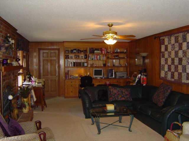 1405 Coventry Road High Point, NC 27262 - Photo 6 of 9 Other. Large den with fireplace and built in book shelves