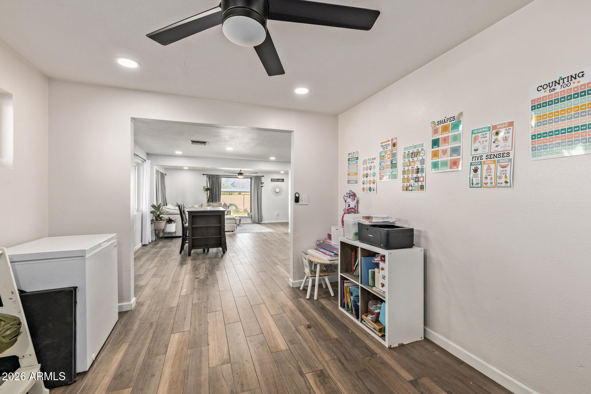 1925 East Greasewood Street Apache Junction, AZ 85119 - Photo 13 of 42 a living room with furniture and a wooden floor
