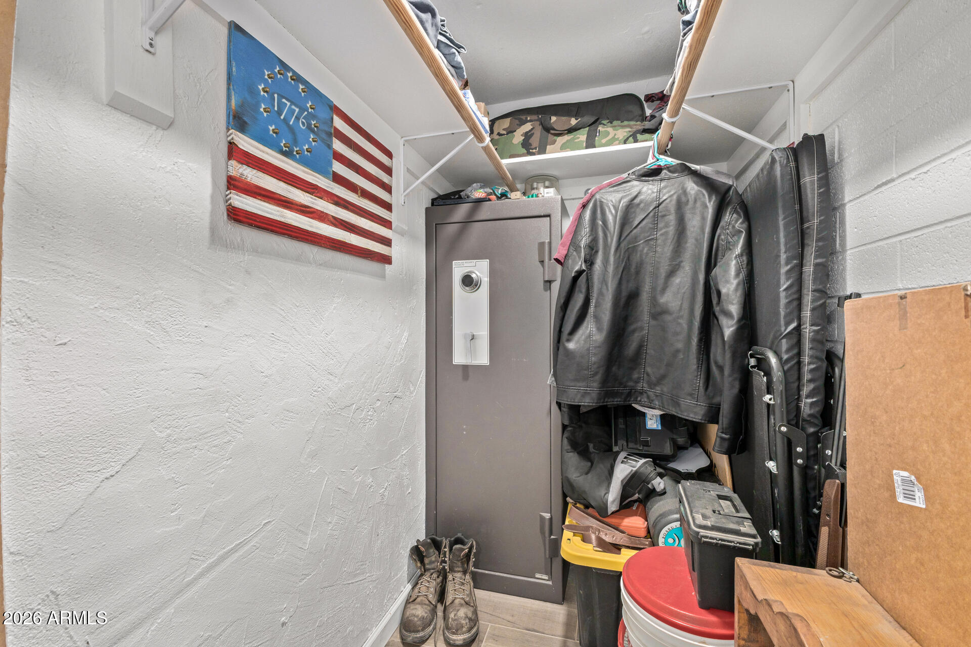 1925 East Greasewood Street Apache Junction, AZ 85119 - Photo 27 of 42 a view of walk in closet with clothes and shoes