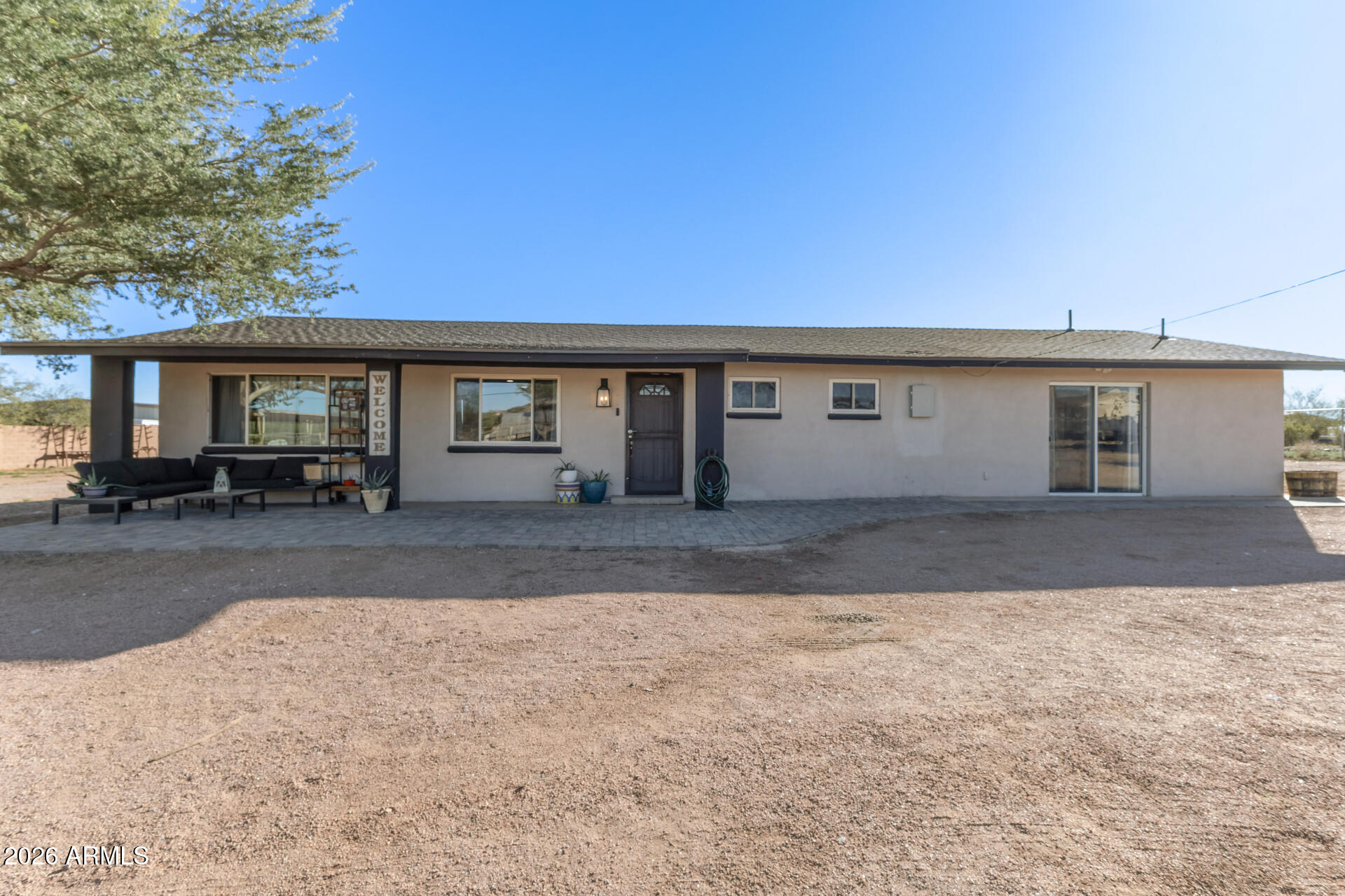 1925 East Greasewood Street Apache Junction, AZ 85119 - Photo 2 of 42 front view of house with a yard