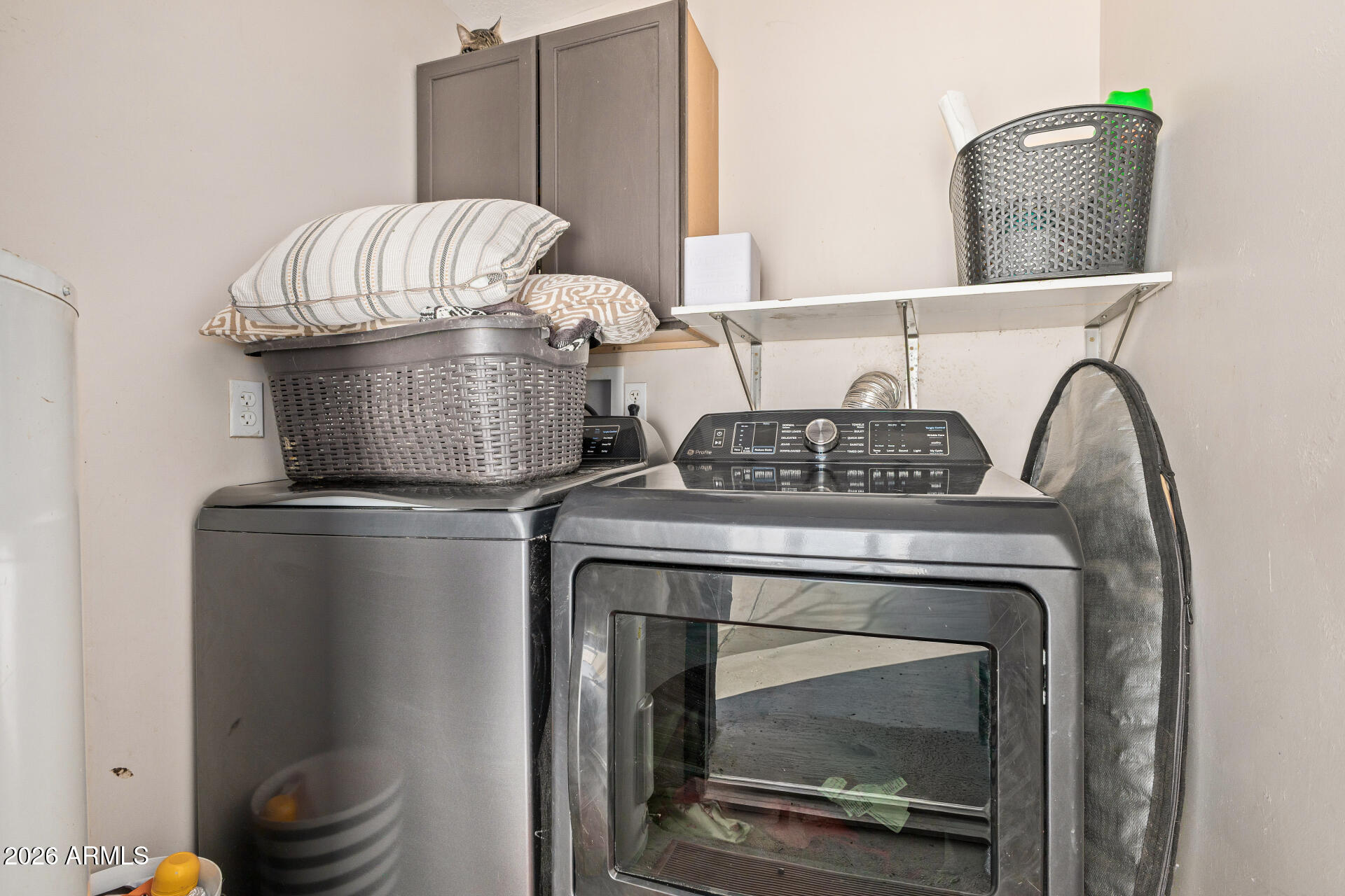 1925 East Greasewood Street Apache Junction, AZ 85119 - Photo 31 of 42 a kitchen with a stove and a microwave