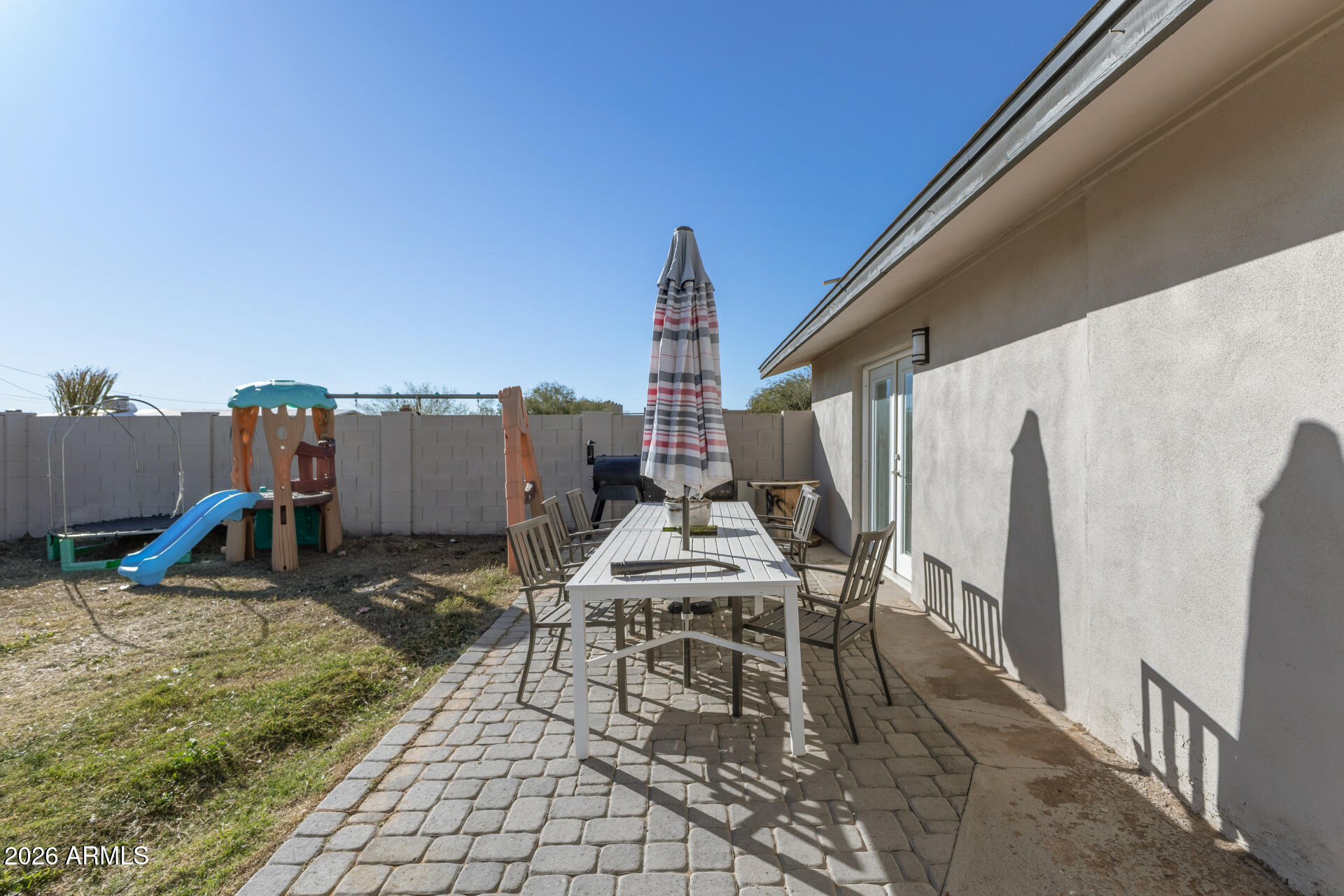 1925 East Greasewood Street Apache Junction, AZ 85119 - Photo 39 of 42 a view of a dinning table and chairs in patio