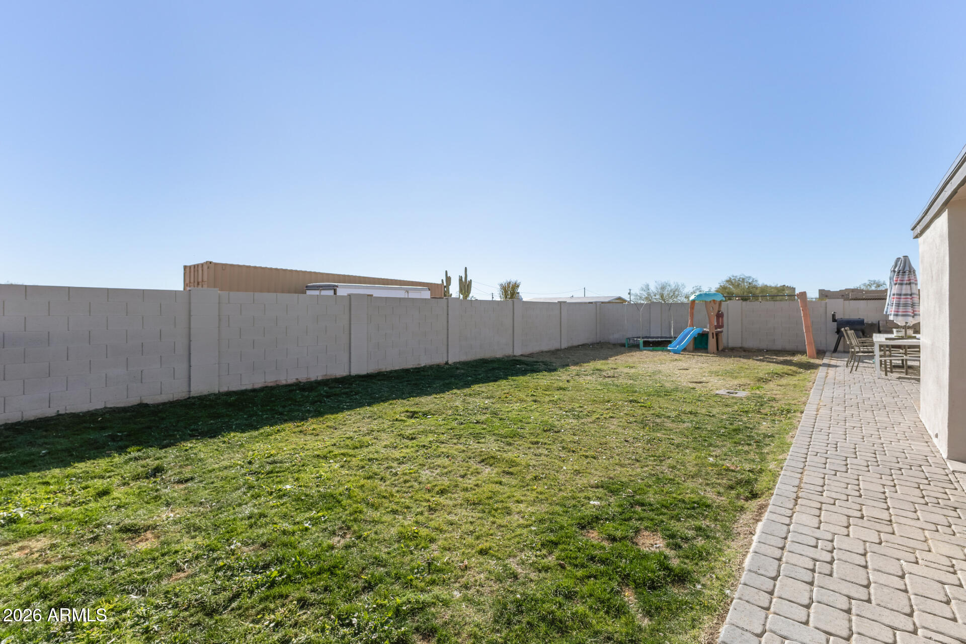 1925 East Greasewood Street Apache Junction, AZ 85119 - Photo 6 of 42 a backyard of a house