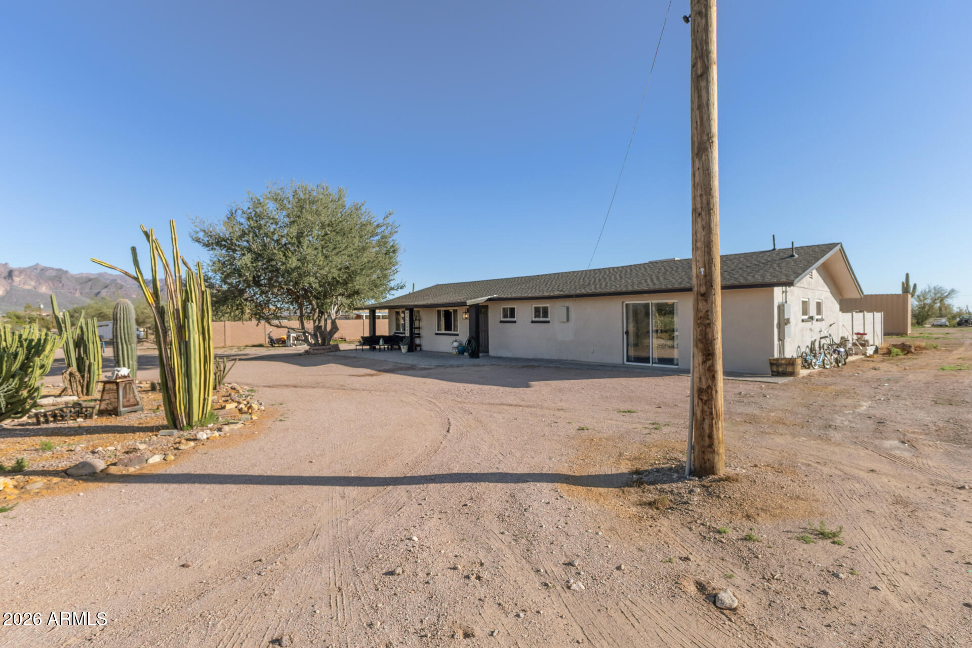 1925 East Greasewood Street Apache Junction, AZ 85119 - Photo 9 of 42 a view of a house with a yard